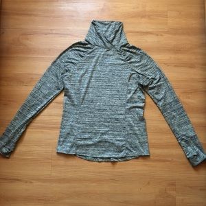 green turtle neck long sleeve work out top